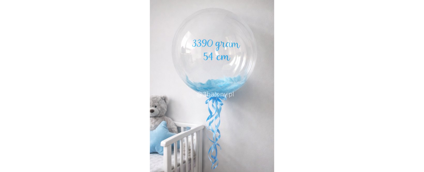 Balon z niebieskimi piórkami + tekst w niebieskim kolorze
