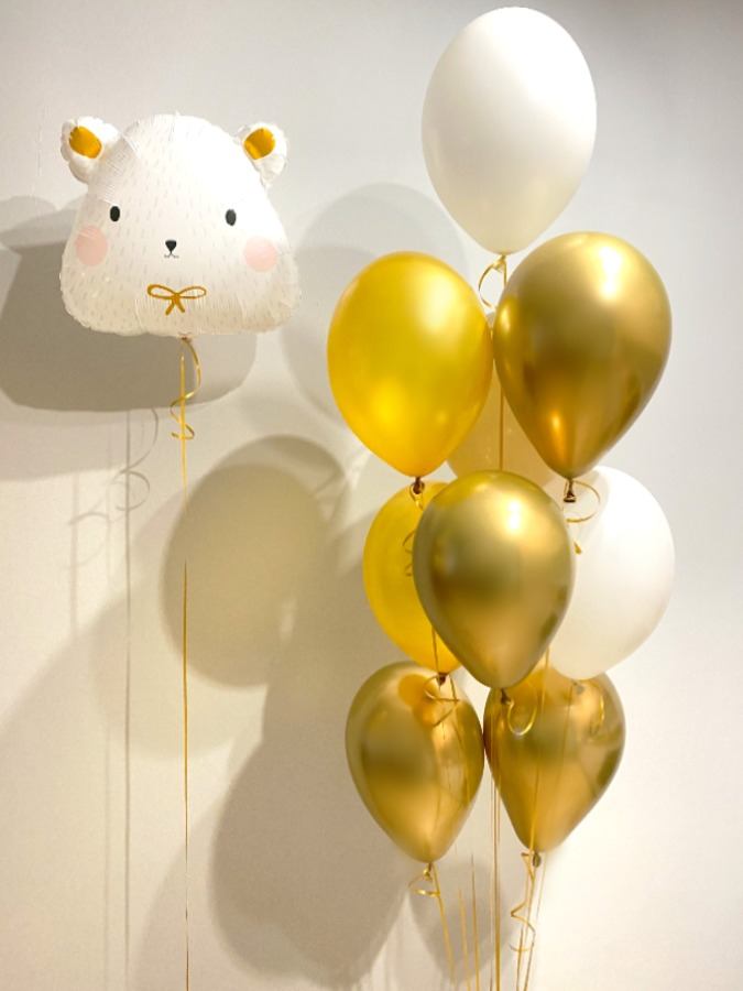 Złote balony z białym misiem