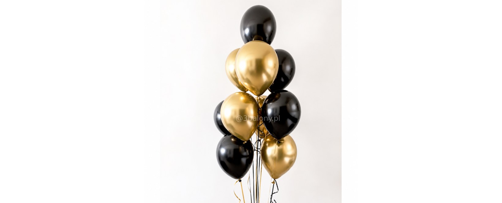 Złote i czarne balony w bukiecie
