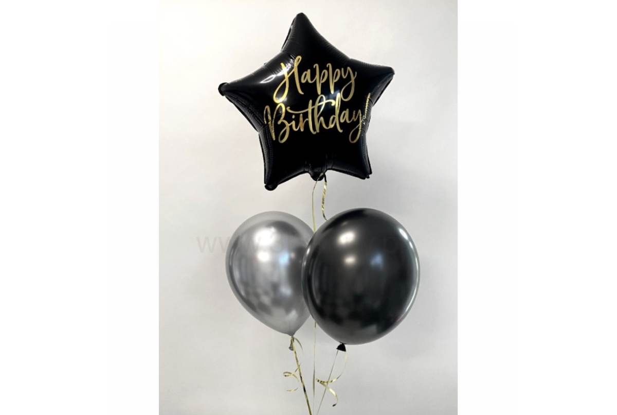 Czarna gwiazdka ze złotym napisem w bukiecie